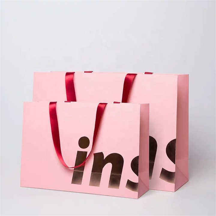 Luxury pink Board Paper Shopping Bag with Ribbon Handle for Clothing Packaging Crafts Fur Versatile Gift Bag