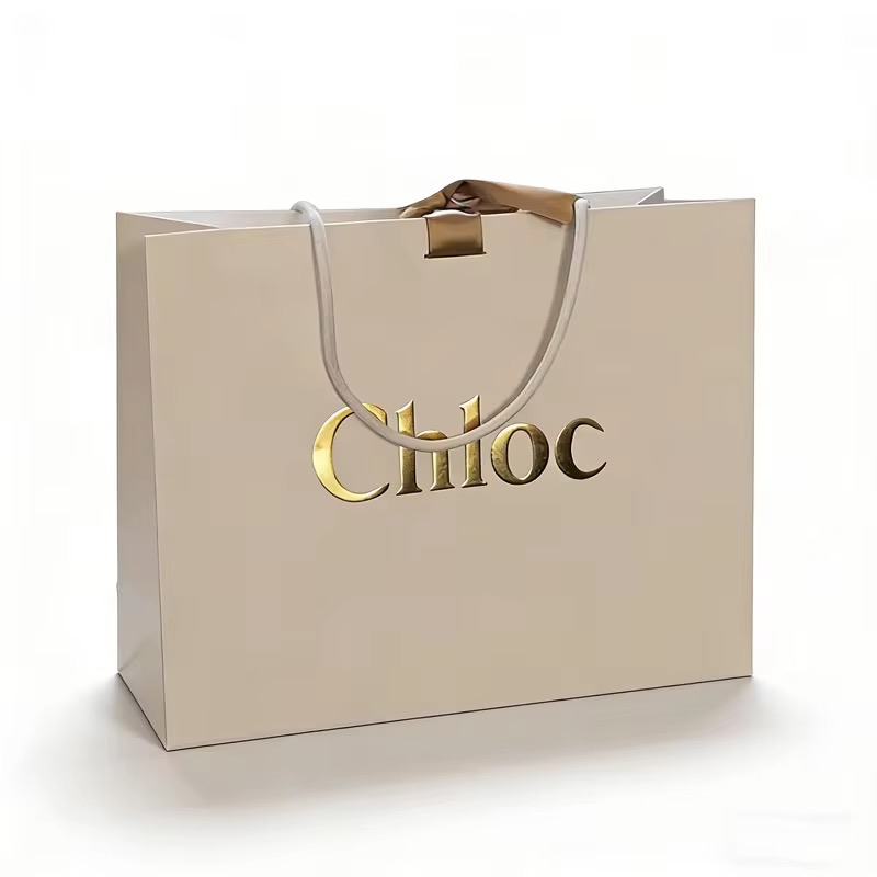 Custom Retail Kraft Paper Shopping Clothing Shopping Gift Bag Luxury Handle Mini Packaging Printed Paper Bag With Logos