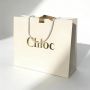 Custom Retail Kraft Paper Shopping Clothing Shopping Gift Bag Luxury Handle Mini Packaging Printed Paper Bag With Logos