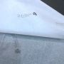 White clothing tissue paper with black logo 