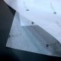 White clothing tissue paper with black logo 